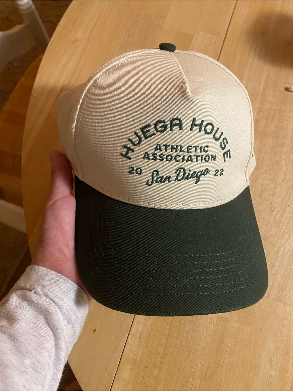 Huega House Athletic Association Cream & Dark Green Trucker Cap